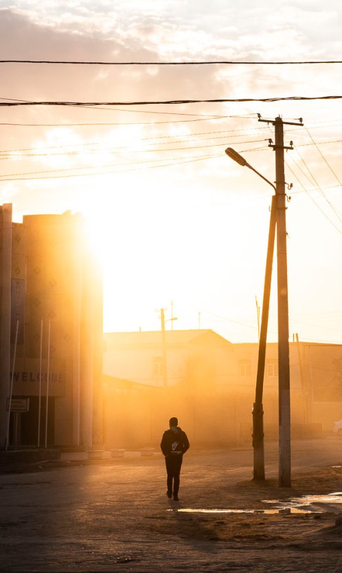 Boy walking home in Khiva